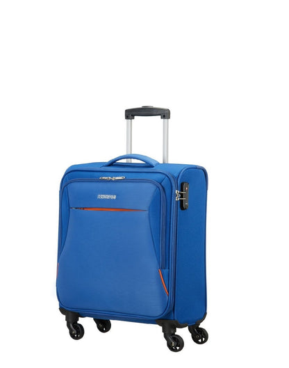 Image showing blue luggage piece with silver and black carrying handle extended.