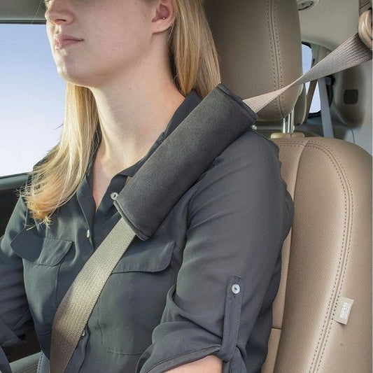 Product Image – Image showing a closeup of a female model inside a vehicle wearing the product in grey on her shoulder.